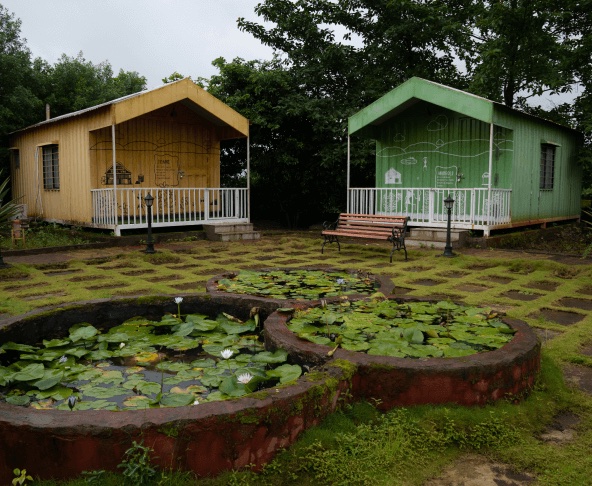 Guest cottages and lily ponds at the retreat venue